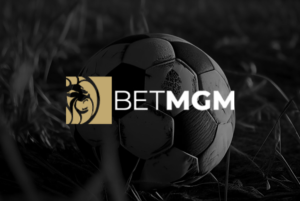 logo betmgm com foto de bola de futebol no fundo
