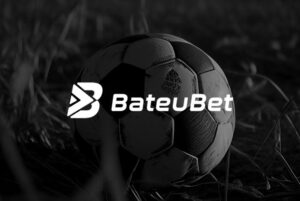 logo da bateubet com imagem de futebol no fundo